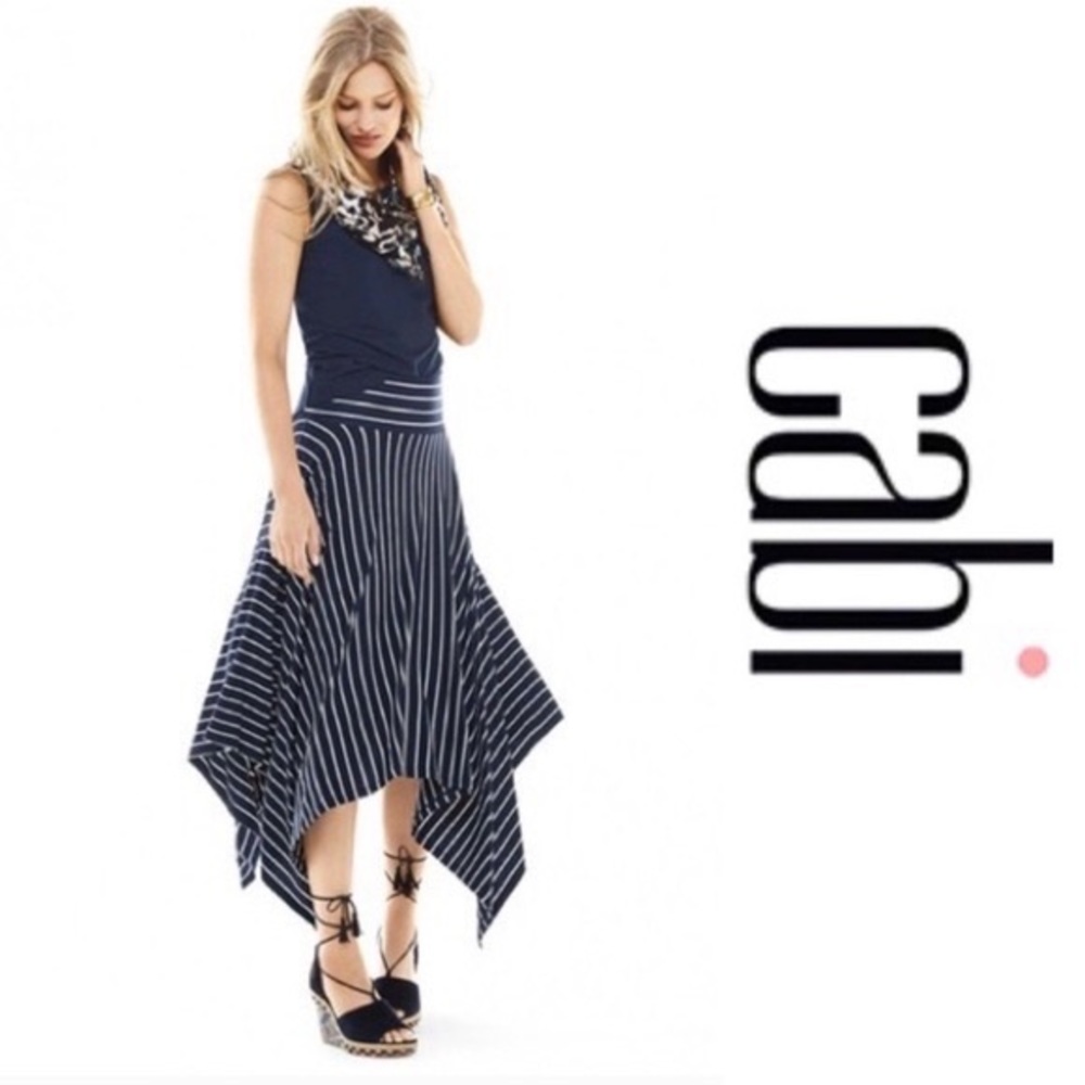 Long, navy and white striped CAbi twirl skirt. Size medium.